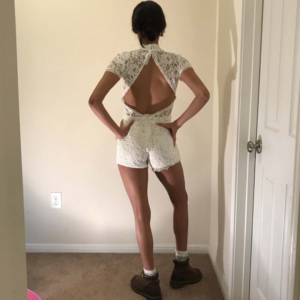 Open back white lace romper by bear dance